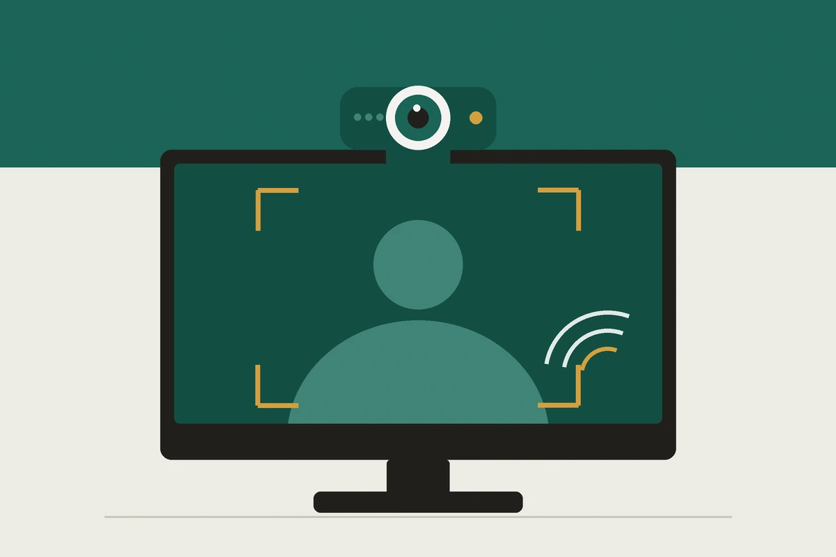 Una webcam sujeta al marco de un monitor, con el encuadre de la persona marcado en pantalla